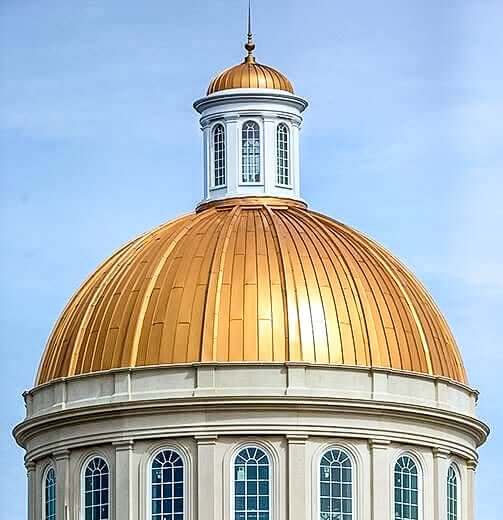 Copper dome on college campus building atChristopher Newport University