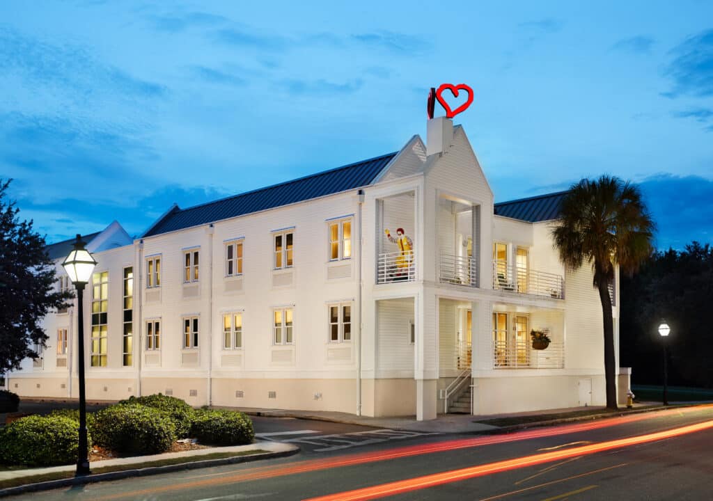 Exterior of large white house - Ronald McDonald House Charities