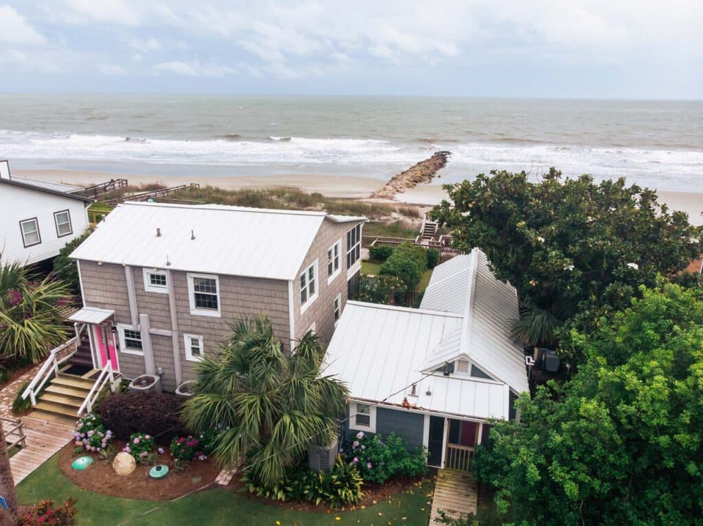Aerial view of a South Carolina beach house with a silver metal roof