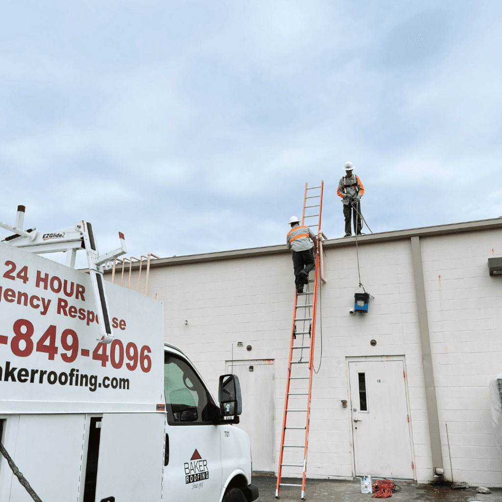 Roofers climbing up a ladder