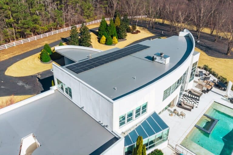 aerial shot of a completed home with single ply PVC roof