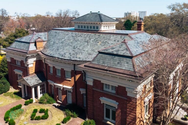 aerial photo of college building with steep slope slate roof