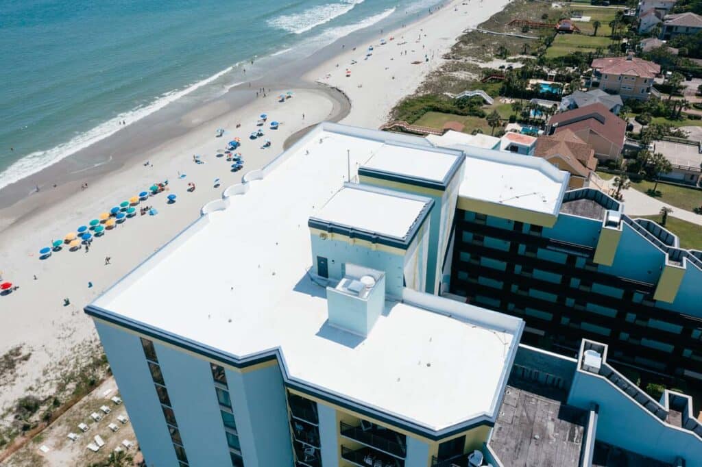 White TPO roof on a beachfront hotel