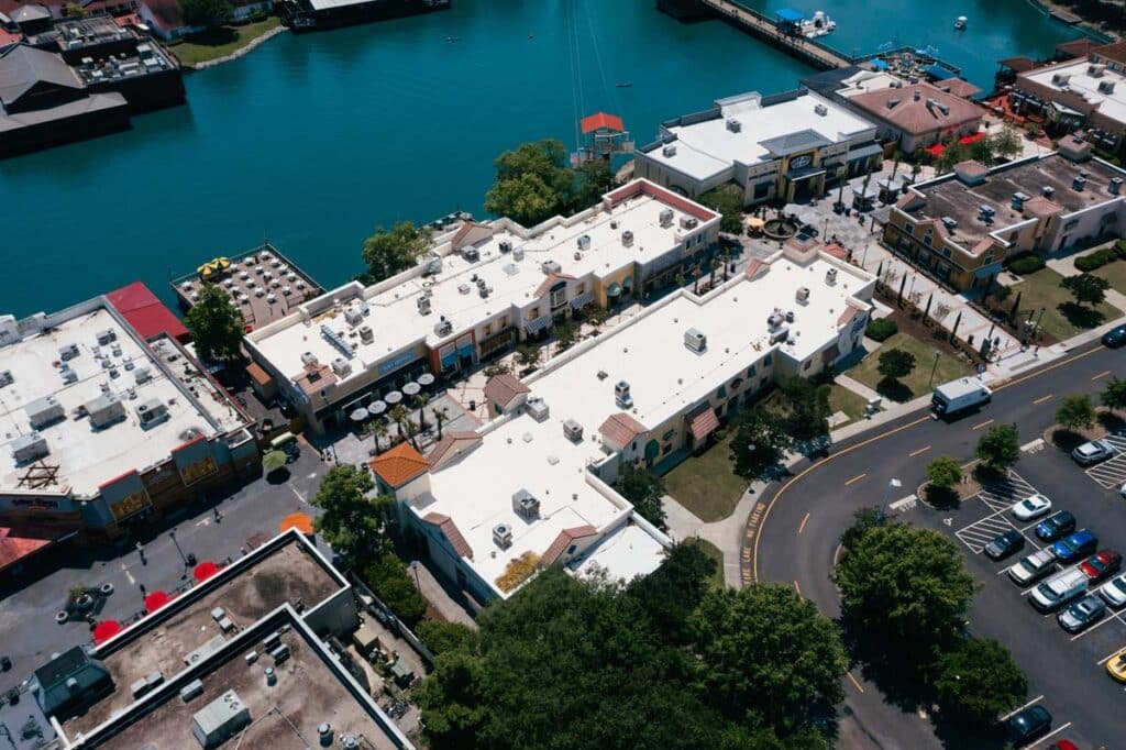 Aerial view of two buildings with PVC KEE roofs
