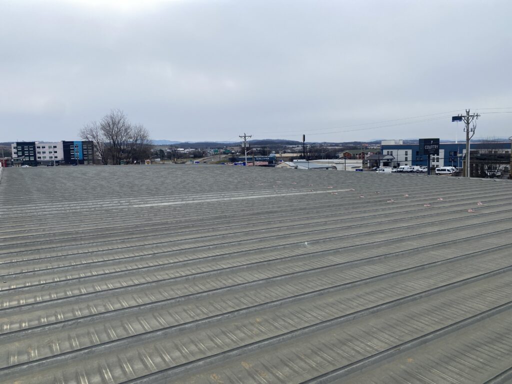 Metal seam repair on commercial property