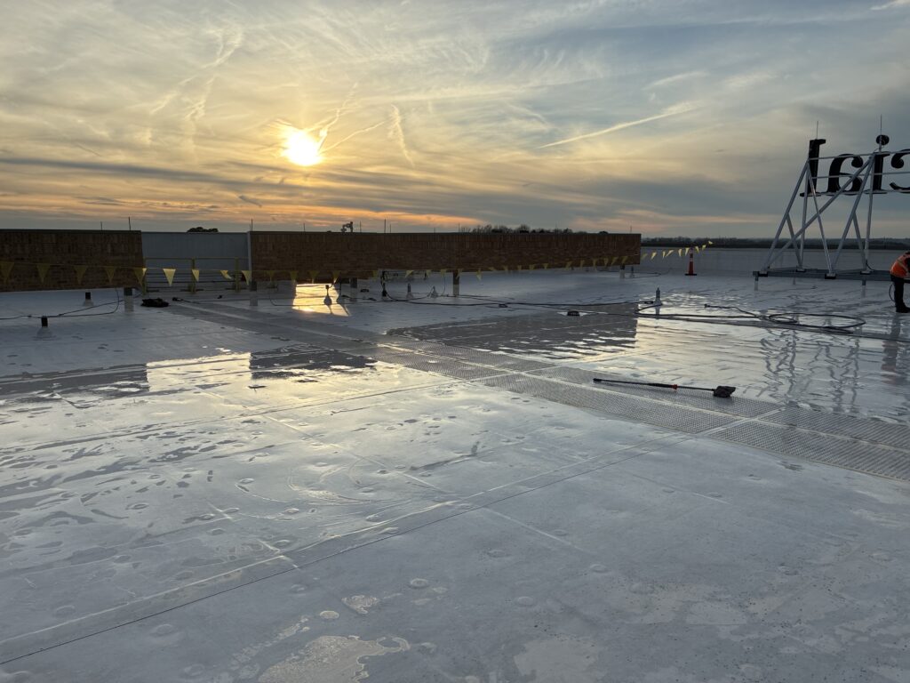 Roof washing on commercial building