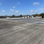 Roof repair on grocery store