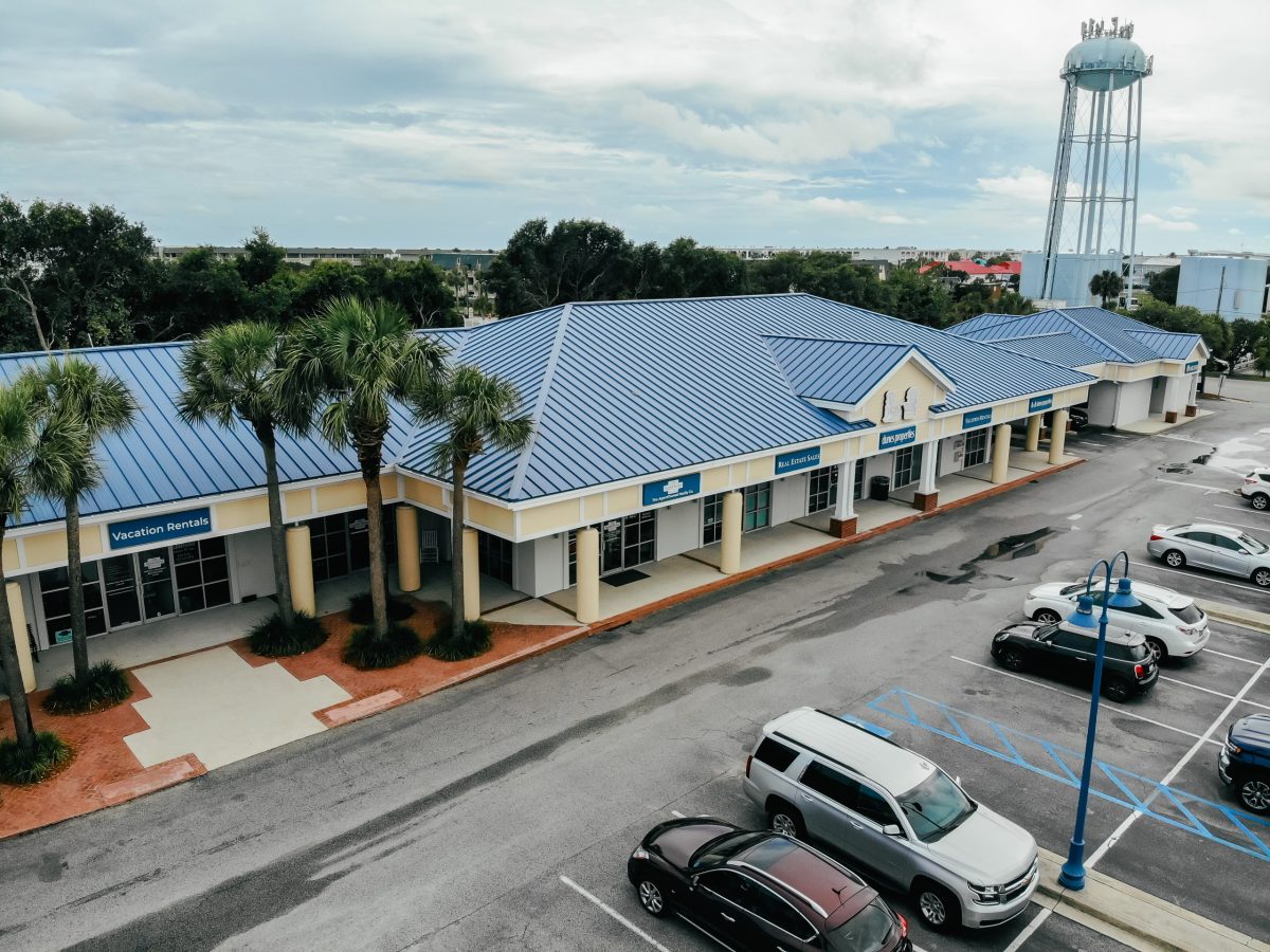 Aerial view of a painted blue metal roof on a shopping center at Isle of Palms beach