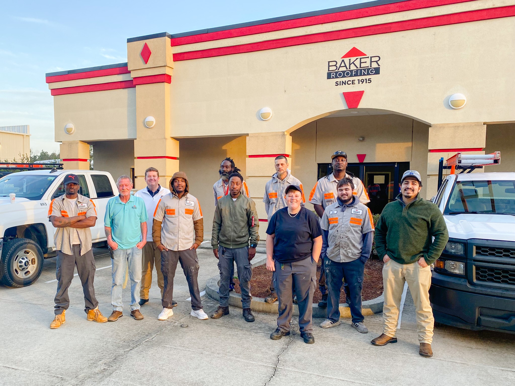 myrtle beach crew outside of their building smiling