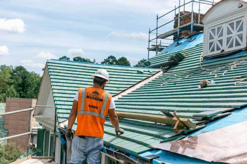 man on an historic roof