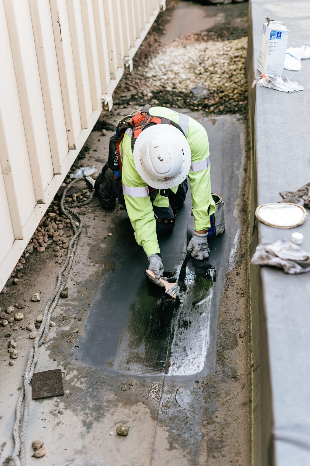 man working on roof