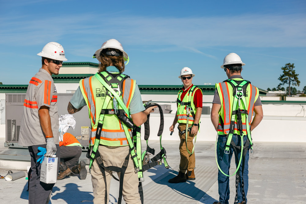 men working on roof