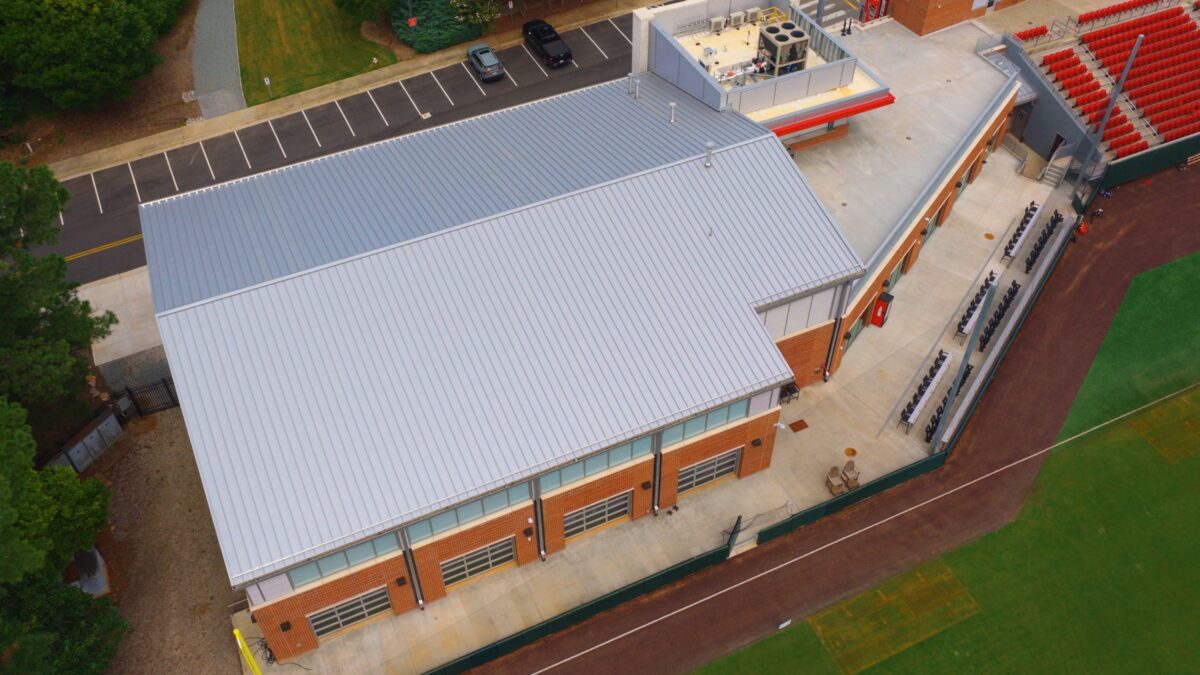 Aerial view of the aluminum standing seam metal roof on the multi-use building at NC State Doak Baseball Stadium in Raleigh, NC