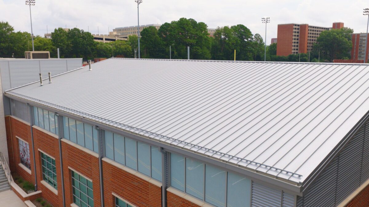 Double-lock aluminum standing seam metal roof on the multi-use building at NC State Doak Baseball Stadium in Raleigh, NC